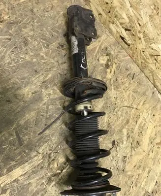 Mitsubishi Colt Front shock absorber with coil spring