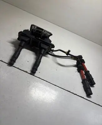Volkswagen PASSAT B5 High voltage ignition coil 058905105A