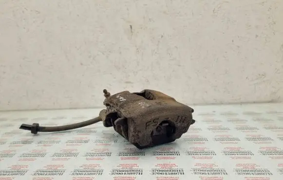 Volkswagen Golf IV Front brake caliper