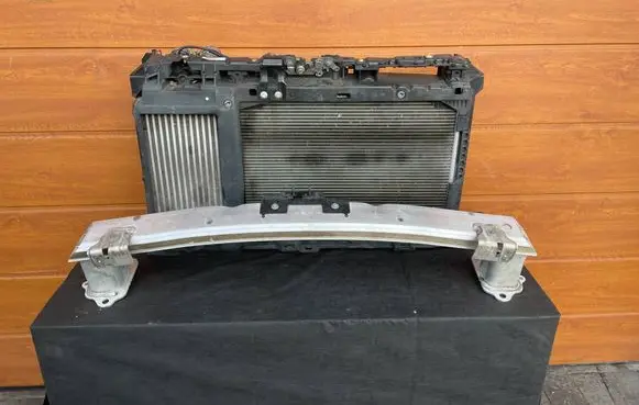 Peugeot 208 II Radiator support slam panel