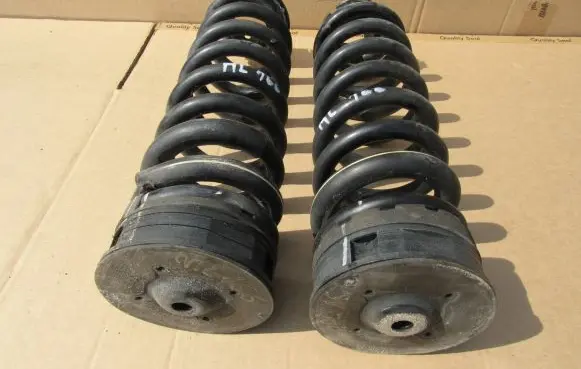 Mercedes-Benz ML W166 Rear coil spring rubber mount A1663240684