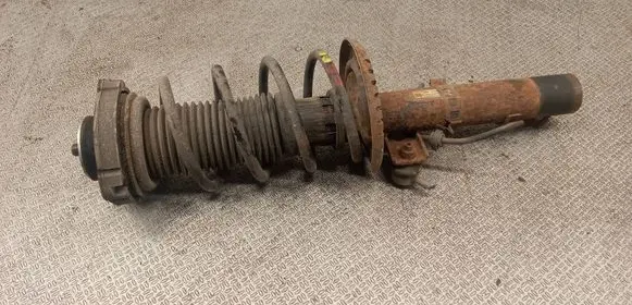 Audi A2 Front shock absorber with coil spring 