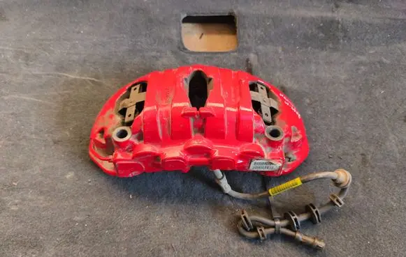 Porsche Macan (95B) Front brake caliper 95B615105AS