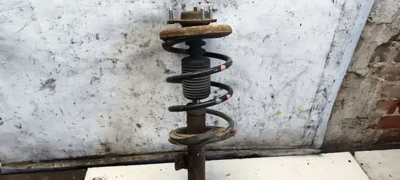 Mitsubishi Lancer X Front shock absorber with coil spring 
