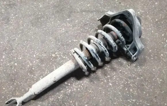 Audi A6 S6 C6 4F Front shock absorber with coil spring