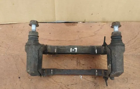 Infiniti EX Front Brake Caliper Pad/Carrier 