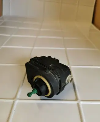 Renault Scenic I Headlight level adjustment motor 07700840141