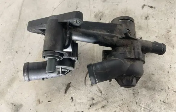 Thermostat/thermostat housing