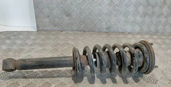 Mitsubishi Pajero Front shock absorber with coil spring MR554292