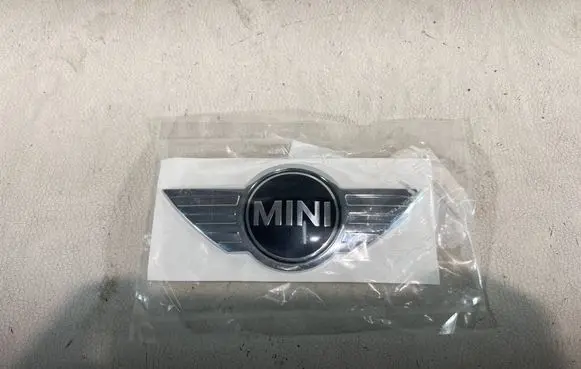 Mini One - Cooper R57 Manufacturer badge logo/emblem 51142754973