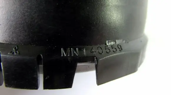 Mitsubishi Colt Dash center air vent grill MN140559