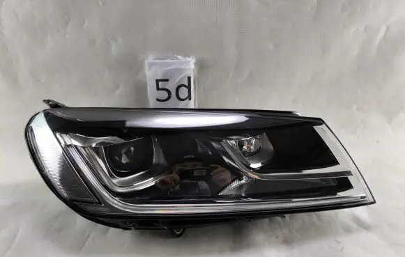 Volkswagen Touareg II Headlight/headlamp 7P1941034A