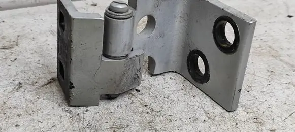 Front door lower hinge