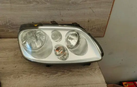 Volkswagen Touran I Headlight/headlamp 1T0941006D