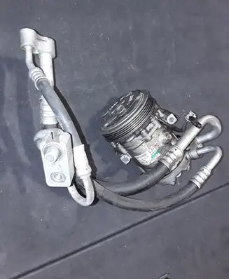 Opel Tigra B Air conditioning (A/C) compressor (pump) 07066209562 24461719