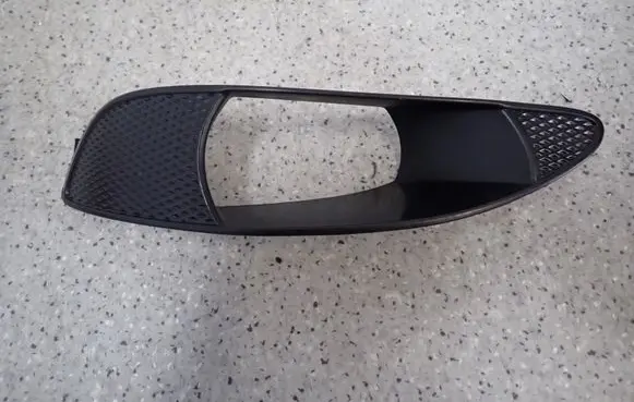 Toyota Corolla E120 E130 Front fog light trim/grill 5212802030