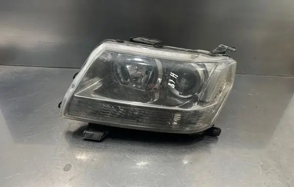 Suzuki Grand Vitara II Headlight/headlamp 10059083