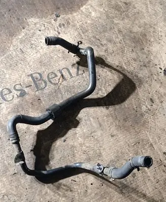 Volkswagen Touareg I Engine coolant pipe/hose 7L6121065D