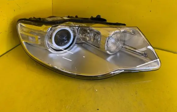 Volkswagen Touareg I Headlight/headlamp 7L6941032C