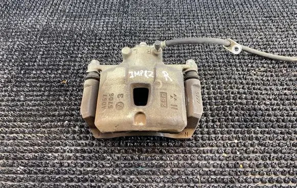 Subaru Impreza IV Front brake caliper 