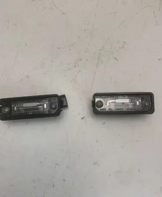 Volkswagen PASSAT CC Number plate light 1J6943021B