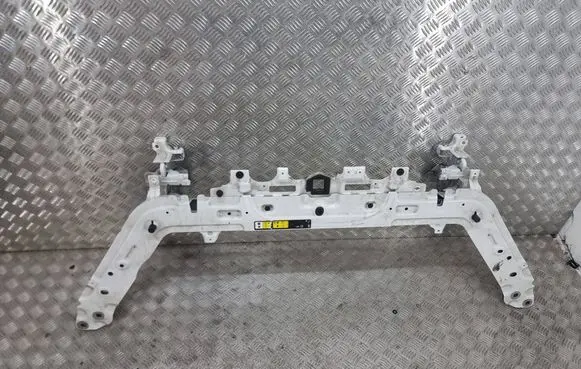 Top upper radiator support slam panel