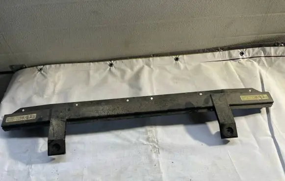 Top upper radiator support slam panel
