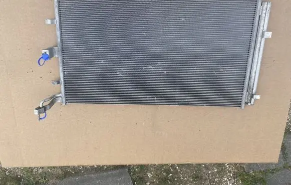 Ford Puma A/C cooling radiator (condenser) JN11-19710-AC