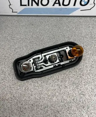 BMW 5 E39 Tail light bulb cover holder 2496339