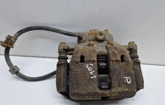 Mitsubishi Colt Front brake caliper 323251545