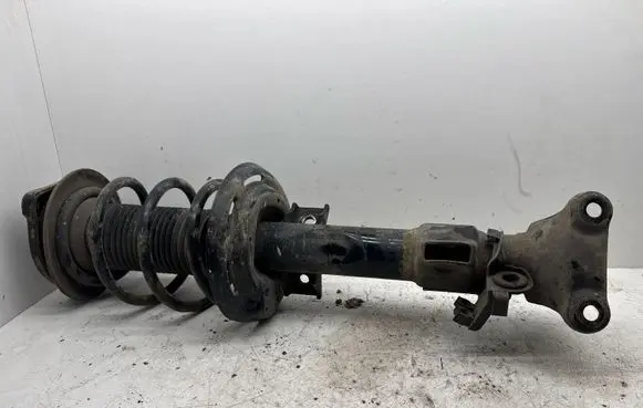 Front shock absorber with coil spring