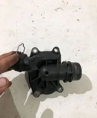 Thermostat/thermostat housing