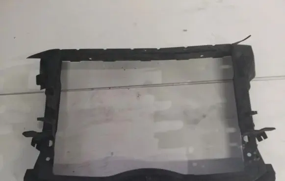 Radiator support slam panel