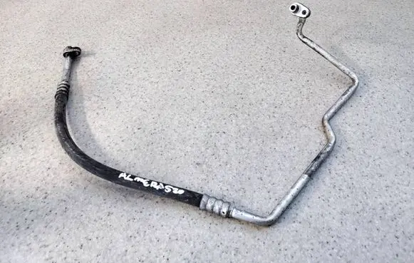 Nissan Almera N16 Air conditioning (A/C) pipe/hose 92490BN700