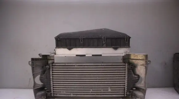 Radiator support slam panel