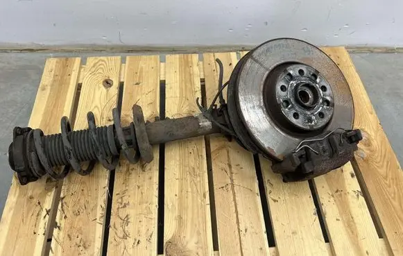Volkswagen Tiguan Front shock absorber with coil spring MMAUTKO18555