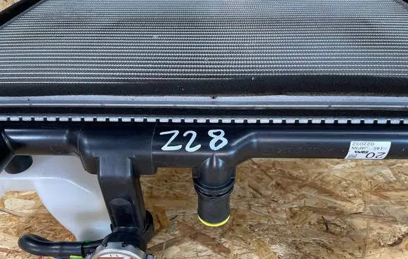 Radiator support slam panel