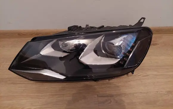 Volkswagen Touareg II Headlight/headlamp 7P1941033