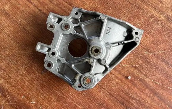 Ford Focus ST A/C compressor mount bracket AV6Q10K360AA