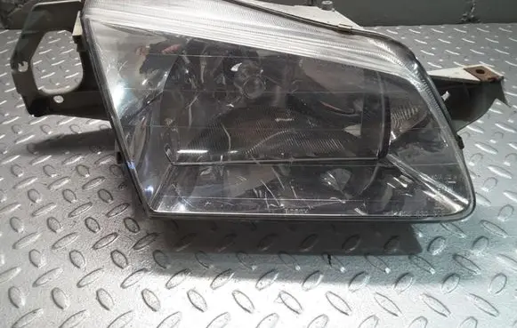 Mazda 323 F Headlight/headlamp 1305235393