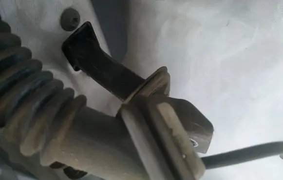 Rear door check strap stopper
