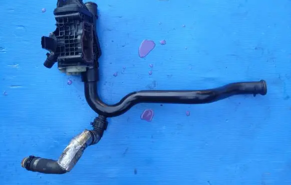 Thermostat/thermostat housing
