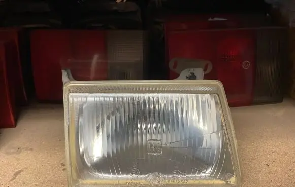 Ford Escort Headlight/headlamp 301124100