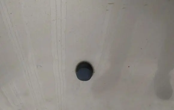 Windshield washer spray nozzle