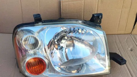 Nissan Navara D22 Headlight/headlamp 100-24810
