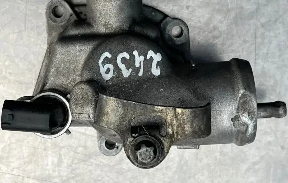 Thermostat/thermostat housing