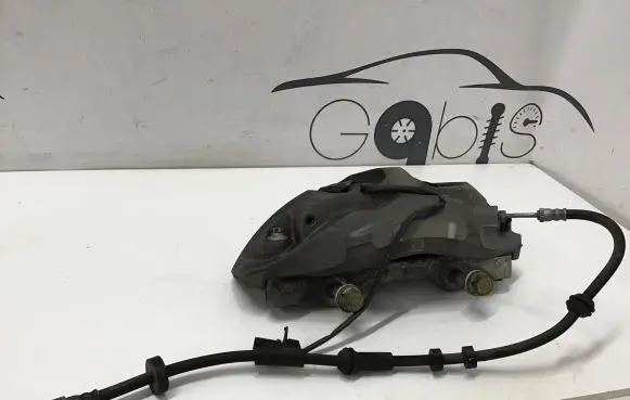 Volkswagen Touareg III Front brake caliper 4M0615105