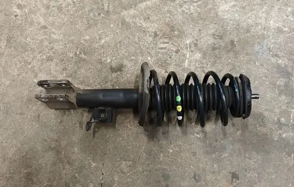 Peugeot 3008 I Front shock absorber with coil spring 9203