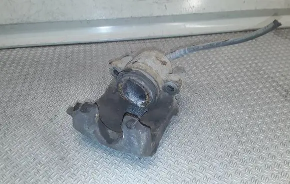 Volkswagen Golf V Front brake caliper 