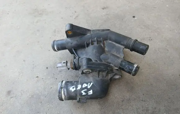 Ford Focus Thermostat housing CM5G-9K478-FA